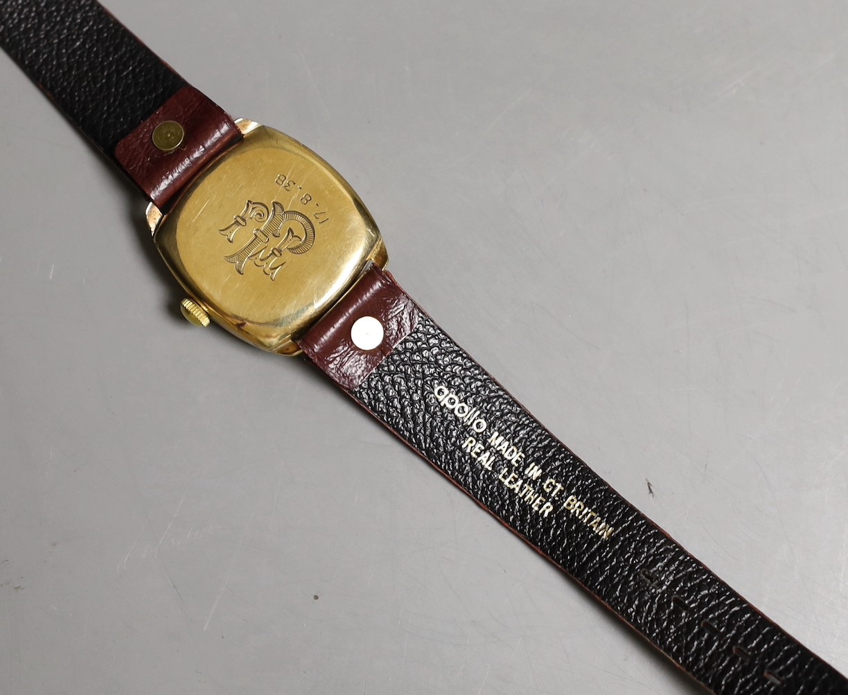 A gentleman's 9ct gold Omega cushion case wrist watch with silvered Arabic dial, monogrammed on the back and dated 1938